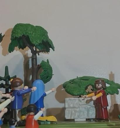 Mehrere Playmobilmännchen  in unserer Welt