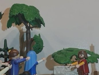 Mehrere Playmobilmännchen  in unserer Welt