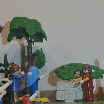 Mehrere Playmobilmännchen  in unserer Welt